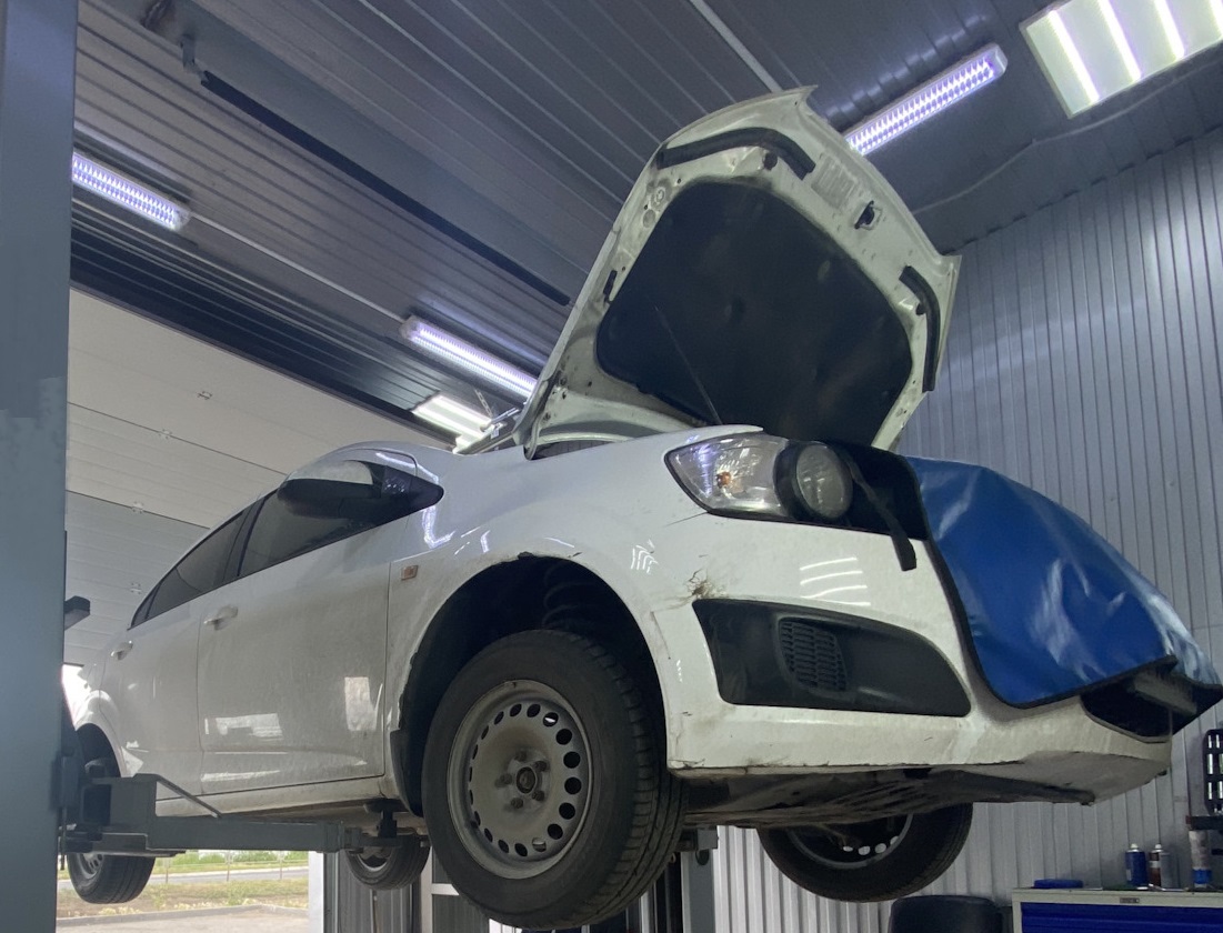 Шевроле Авео в процессе замены катализатора